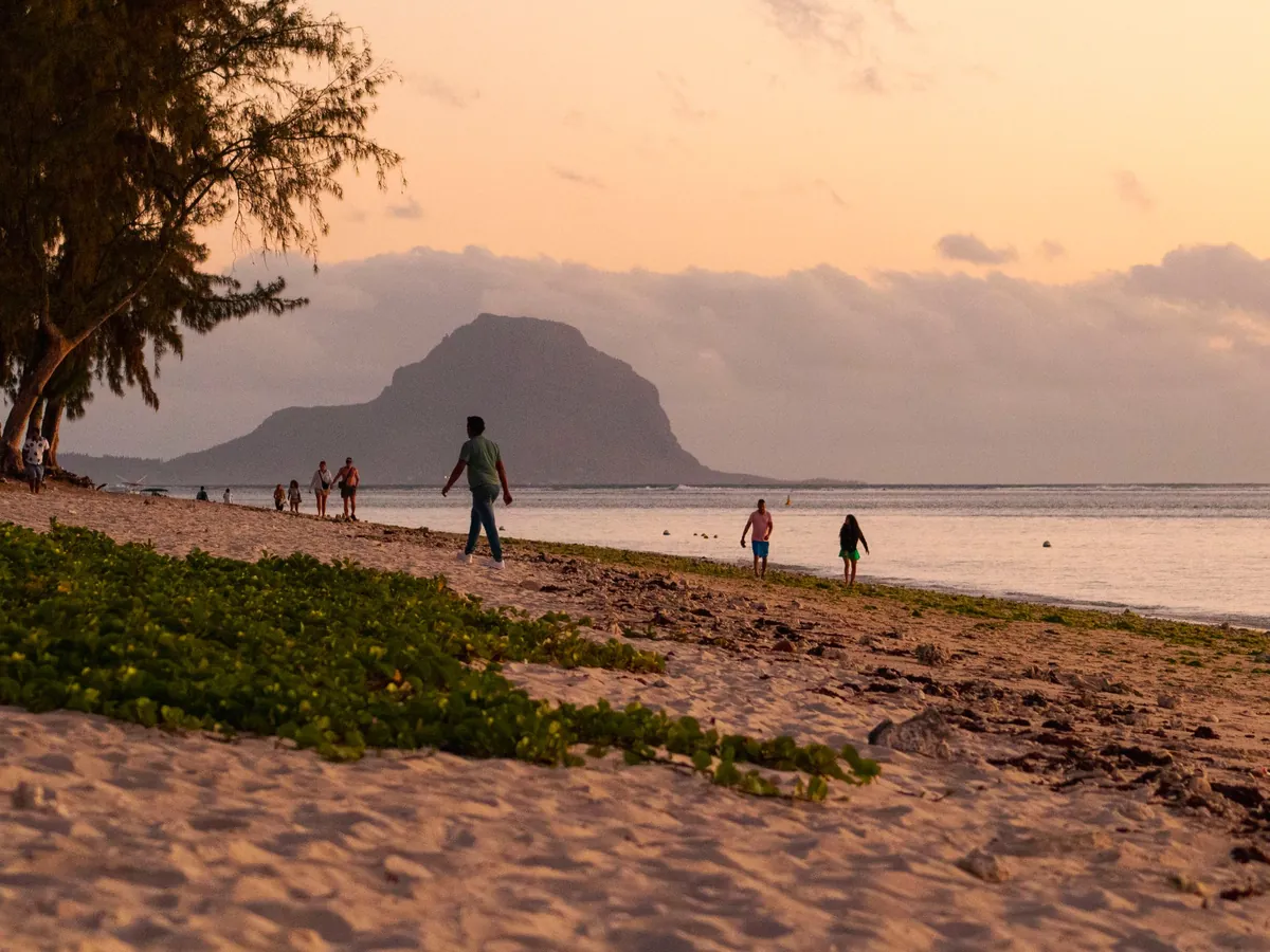 Sunset over the west coast at Flic en Flac, with Le Morne in the distance